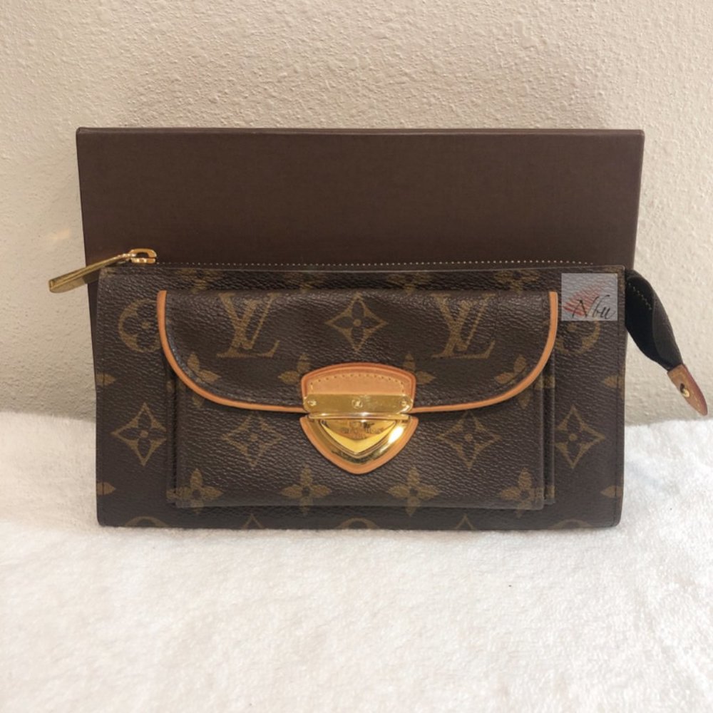 SOLD LOUIS VUITTON Monogram Astrid Wallet